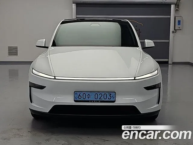 Tesla Model Y — Фото автомобиля 3