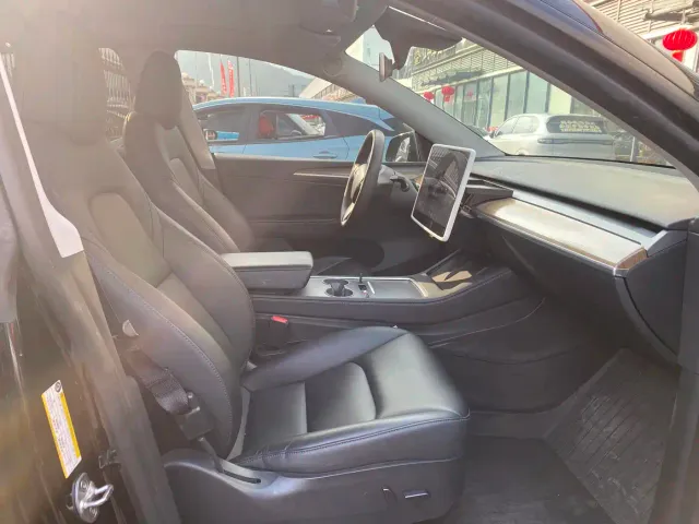 Tesla Model Y — Фото автомобиля 7