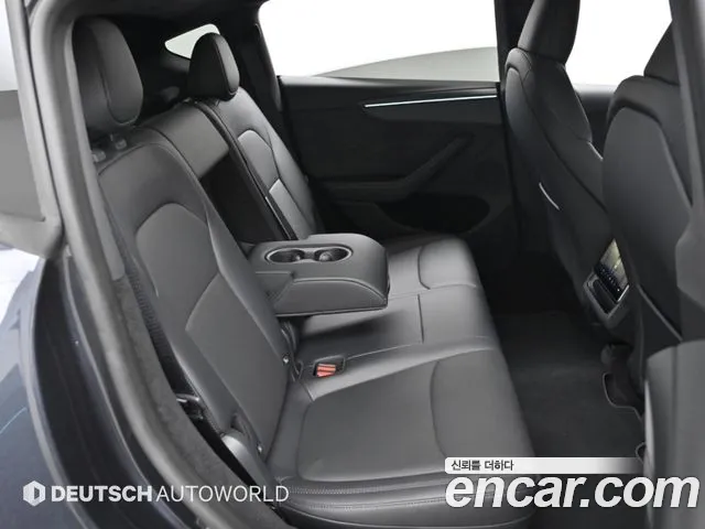 Tesla Model Y — Фото автомобиля 17