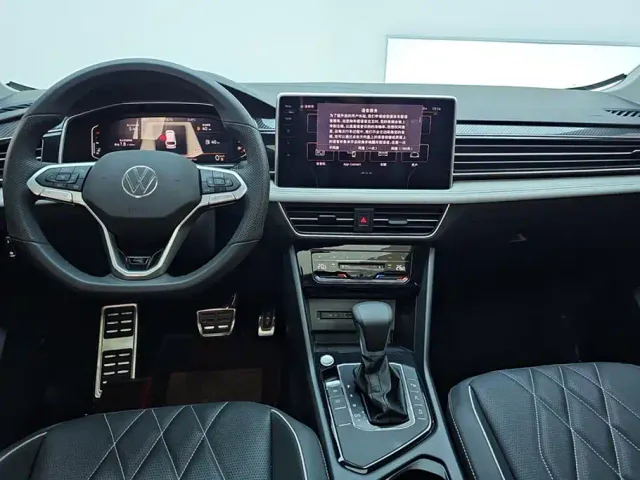 Volkswagen Tiguan L — Фото автомобиля 12