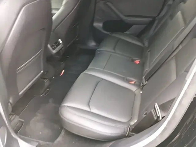 Tesla Model Y — Фото автомобиля 16