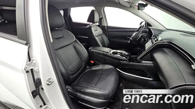 Hyundai Tucson Tucson (NX4) Бензин 1.6 турбо 2WD — Фото автомобиля 26