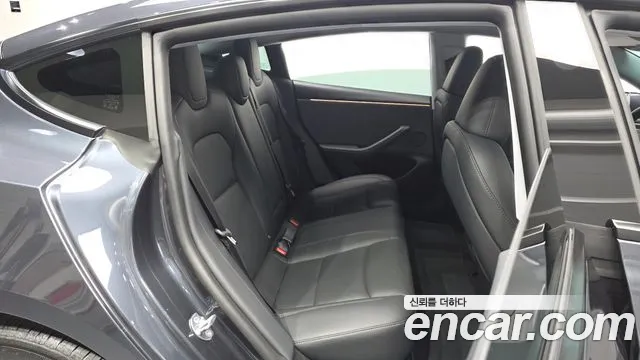 Tesla Model 3 — Фото автомобиля 11