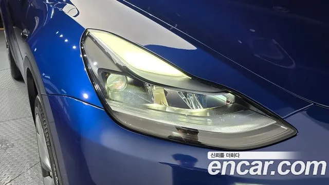 Tesla Model Y — Фото автомобиля 7
