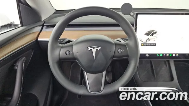 Tesla Model Y — Фото автомобиля 18