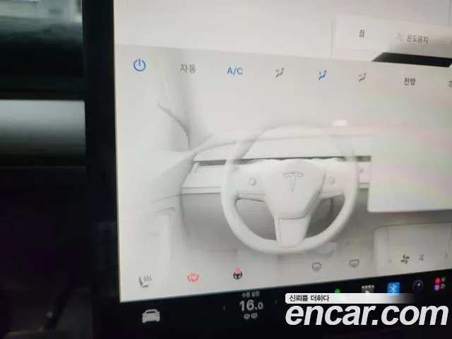 Tesla Model Y — Фото автомобиля 16