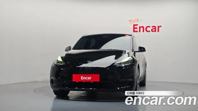 Tesla Model Y — Фото автомобиля 3