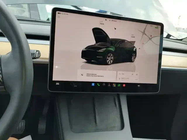 Tesla Model Y — Фото автомобиля 12