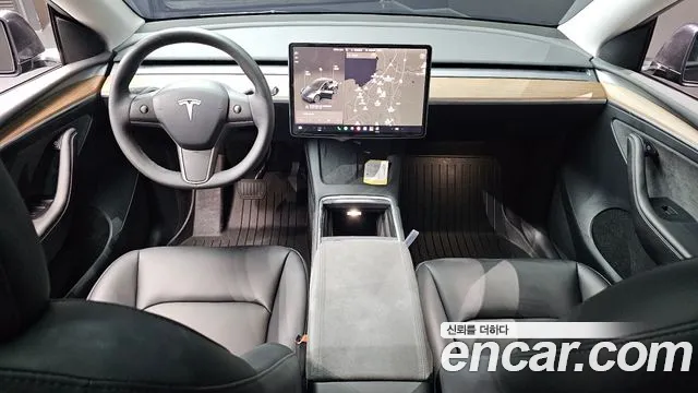 Tesla Model Y — Фото автомобиля 6