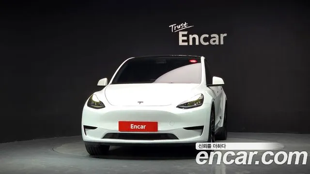Tesla Model Y — Фото автомобиля 3