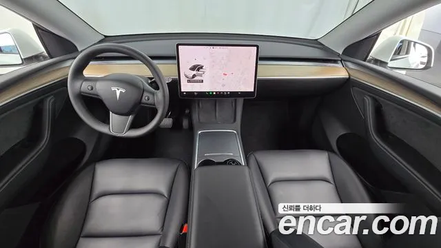 Tesla Model Y — Фото автомобиля 7