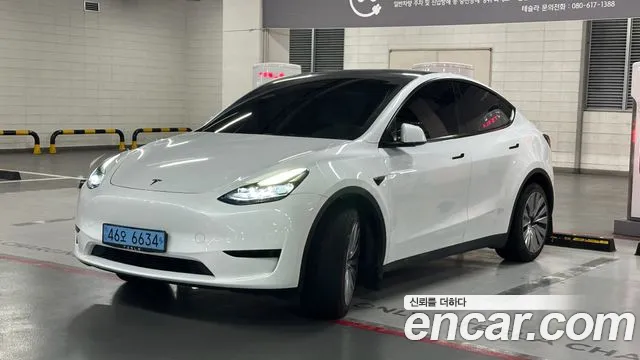 Tesla Model Y — Фото автомобиля 3
