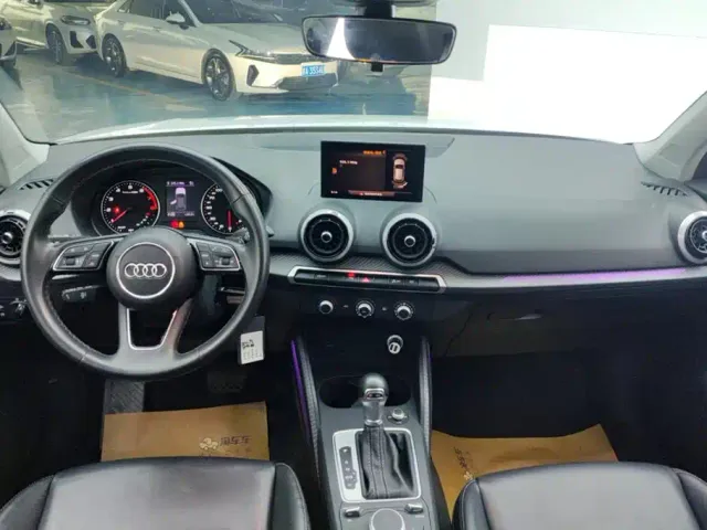 Audi Q2L — Фото автомобиля 12