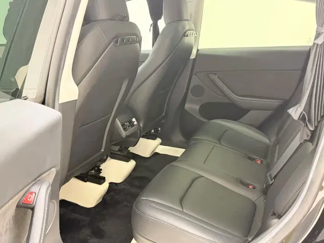 Tesla Model Y — Фото автомобиля 8
