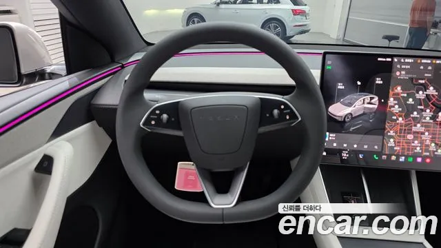Tesla Model Y — Фото автомобиля 13