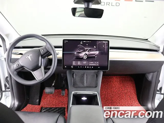 Tesla Model Y — Фото автомобиля 15