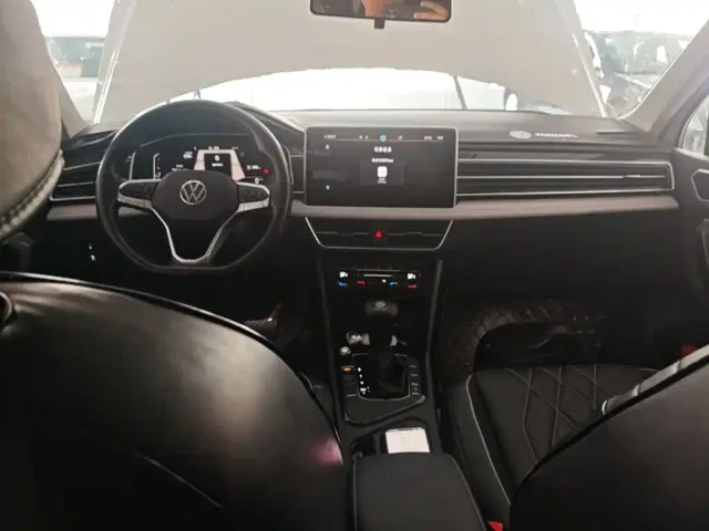 Volkswagen Tiguan L — Фото автомобиля 9