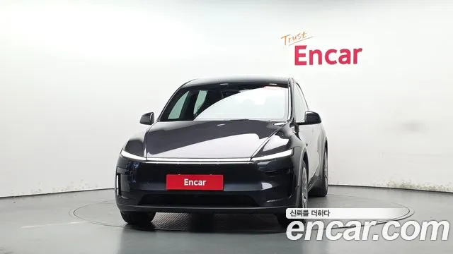 Tesla Model Y — Фото автомобиля 3