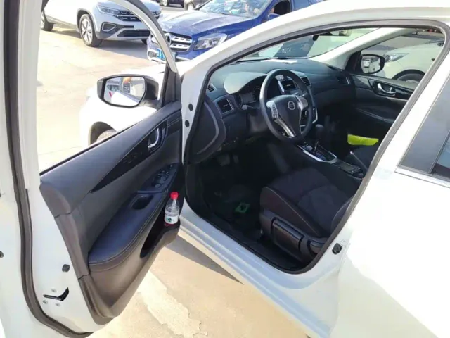 Nissan Tiida — Фото автомобиля 15