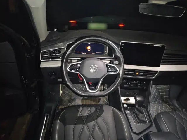 Volkswagen Tiguan L — Фото автомобиля 11