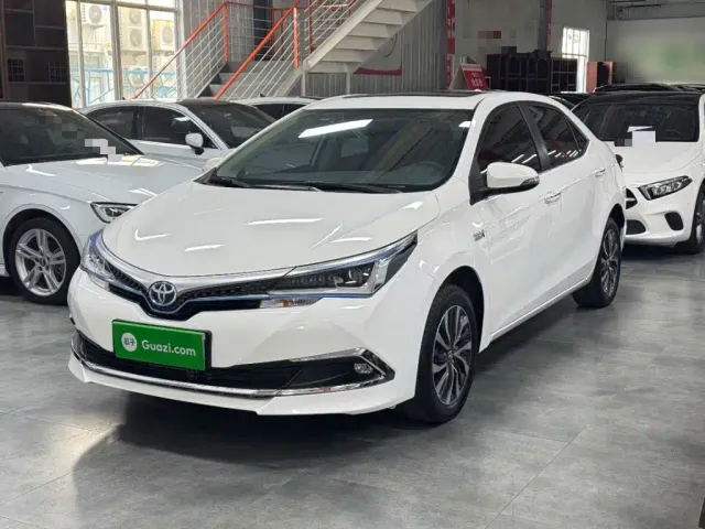Фотография автомобиля — Toyota Corolla Twin Engine E+