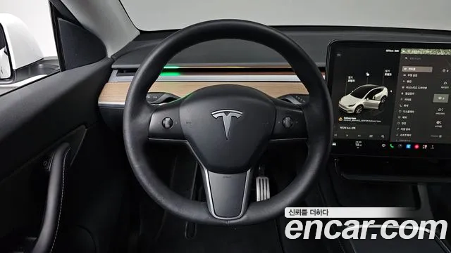 Tesla Model Y — Фото автомобиля 19
