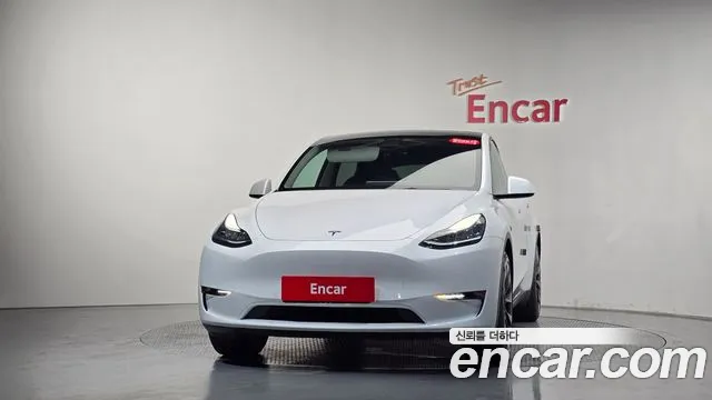 Tesla Model Y — Фото автомобиля 3