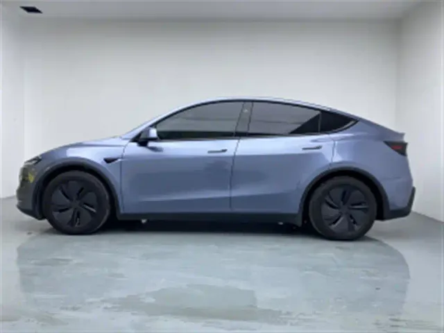 Tesla Model Y — Фото автомобиля 4