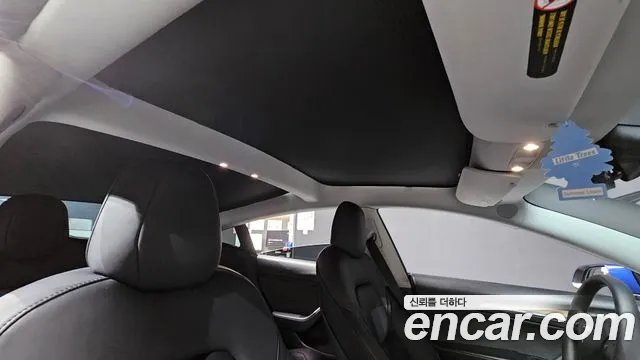 Tesla Model 3 — Фото автомобиля 25