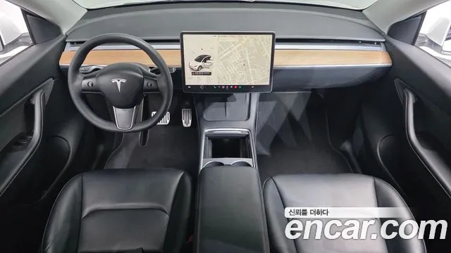 Tesla Model Y — Фото автомобиля 10