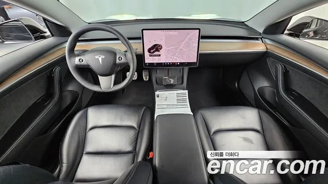 Tesla Model 3 — Фото автомобиля 10