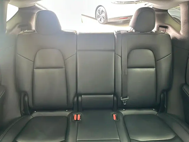 Tesla Model Y — Фото автомобиля 14
