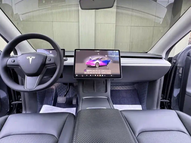 Tesla Model Y — Фото автомобиля 10