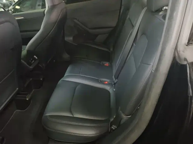 Tesla Model Y — Фото автомобиля 16