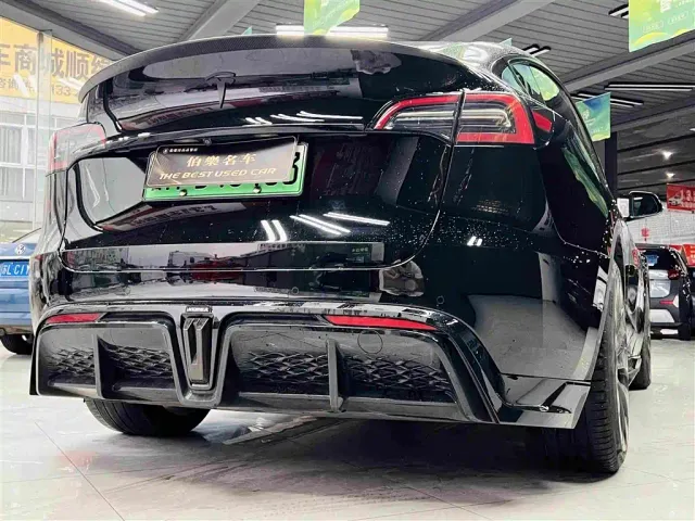 Tesla Model Y — Фото автомобиля 7