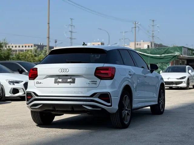 Audi Q2L — Фото автомобиля 9