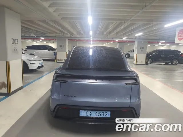 Tesla Model Y — Фото автомобиля 4