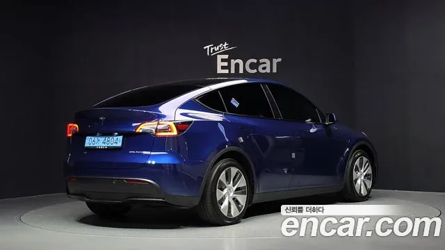 Tesla Model Y — Фото автомобиля 2