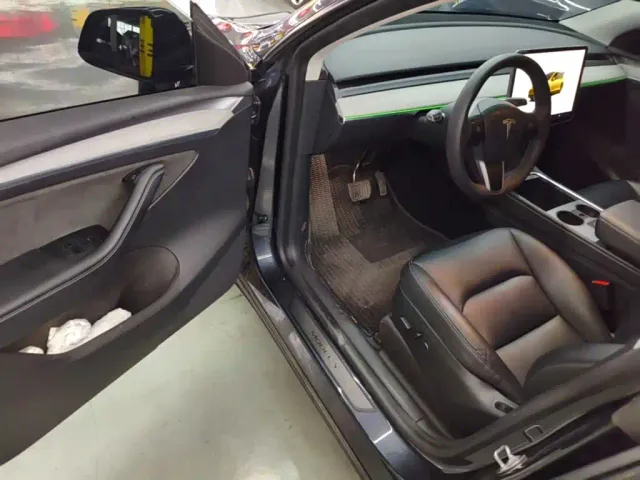 Tesla Model Y — Фото автомобиля 15