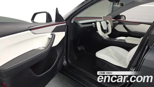Tesla Model Y — Фото автомобиля 15