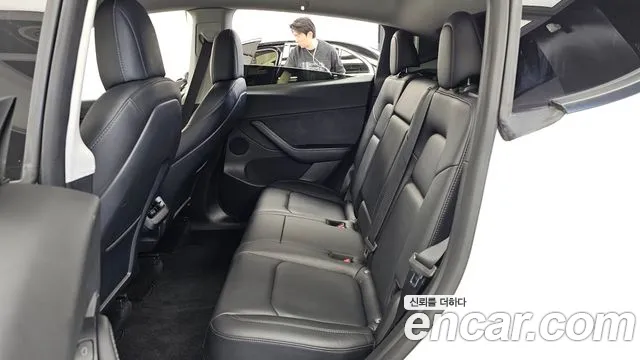 Tesla Model Y — Фото автомобиля 25