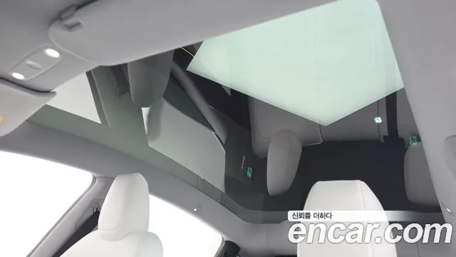 Tesla Model Y — Фото автомобиля 23