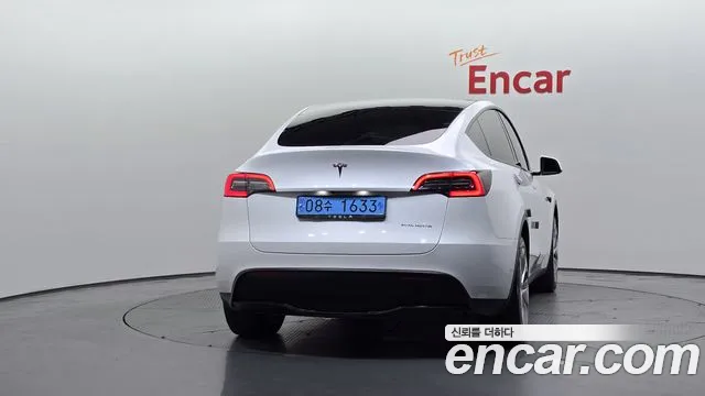 Tesla Model Y — Фото автомобиля 4