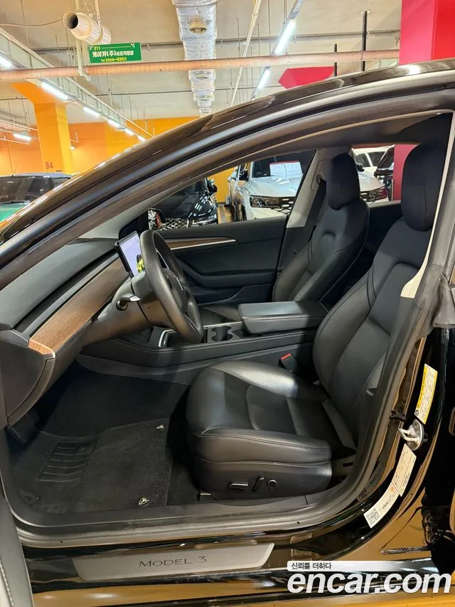 Tesla Model 3 — Фото автомобиля 7