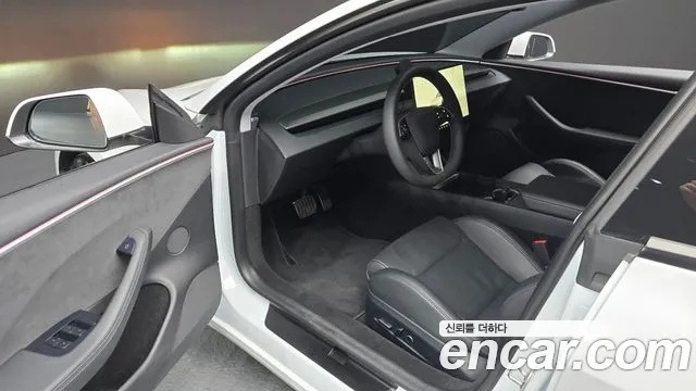 Tesla Model 3 — Фото автомобиля 15