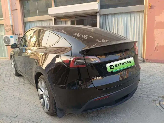 Tesla Model Y — Фото автомобиля 6