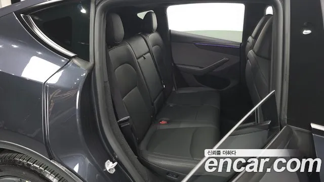 Tesla Model Y — Фото автомобиля 18