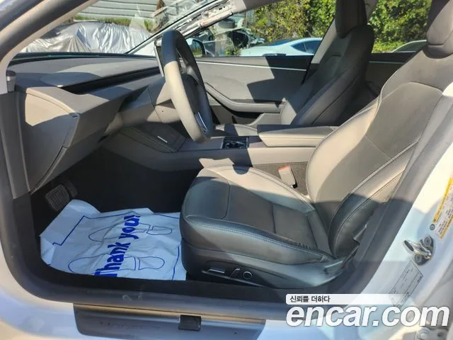 Tesla Model 3 — Фото автомобиля 6