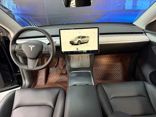 Tesla Model Y — Фото автомобиля 7