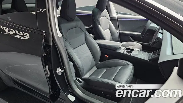 Tesla Model 3 — Фото автомобиля 10